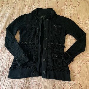 Classy black button down jacket with gold detail.